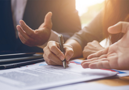 Lawyer signing paperwork